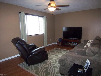 The living room has good  light from a picture win
