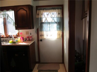 Kitchen door gives easy access to back deck for gr