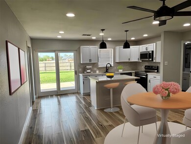 virtually staged open living and kitchen