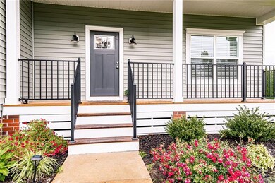 Relax on the extended front porch overlooking beau