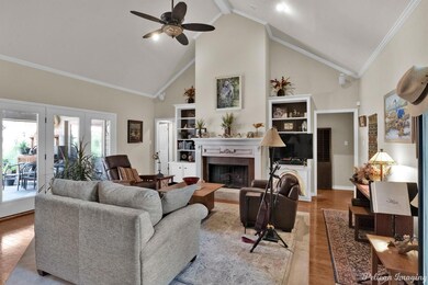 main living area/vaulted ceiling/fireplace