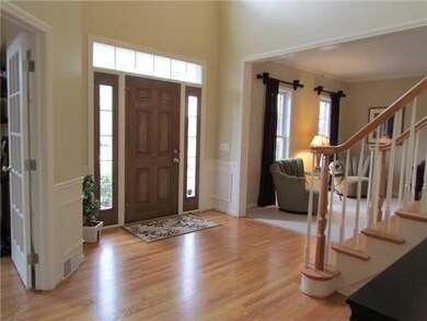 Foyer. Main entry, two-story foyer with hardwood f