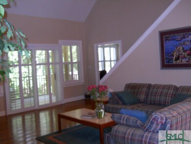 Great Room has double vaulted ceiling.  Entire liv