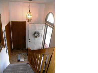The entry foyer has the added value of a large coa
