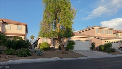 View of front of house with driveway, stucco sidin