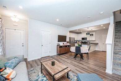 Living room with light wood-type flooring