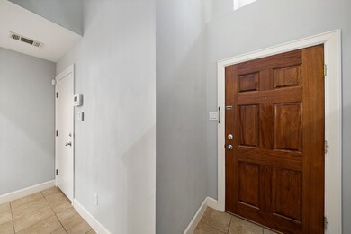 View of hallway leading from the front door to the