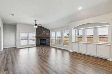 Unfurnished living room with dark wood-type floori