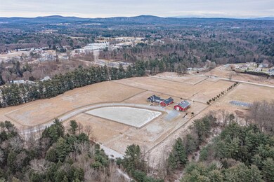 The 25 acre parcel contains a riding arena, five grazing pastures and large garden spaces. Pastures and garden areas served by a drilled will and water spigots.
