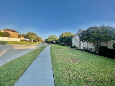 View of concrete road with sidewalks