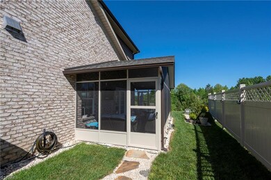 Walkway leading up to the screened porch