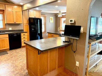 Breakfast counter seating area! The small TV seen in this picture will stay.