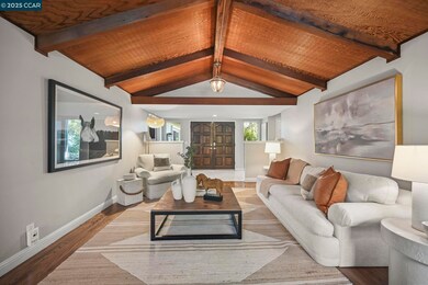 Hardwood floors throughout the whole home!Exposeed Beamed ceiling. stunning main living area.