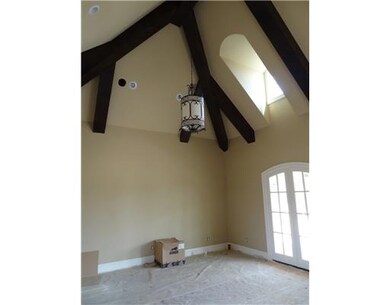 Living Room. Hand carved wood beams