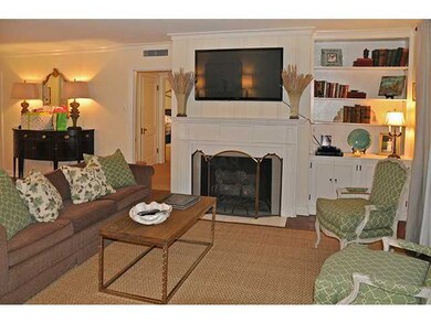 Living room has fireplace with gas logs