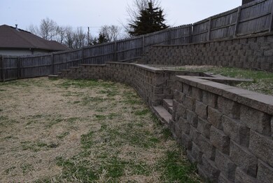 Landscaped stone tiered yard