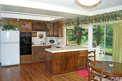 Spacious eat in kitchen overlooking backyard