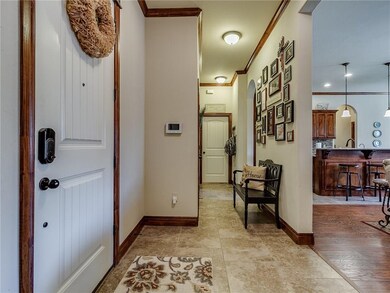 TILED ENTRANCE FROM FRONT DOOR LOOKING INTO HALL A