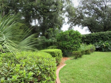 Beautifully Landscaped With Concrete Curbing.