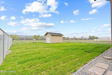 Backyard w/ sod and sprinkler system