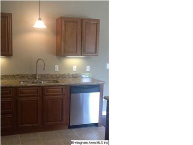 Stainless appliances and under cabinet lighting.