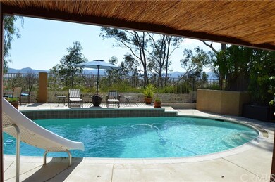 VIEW OF BACKYARD/POOL LOOKING WEST