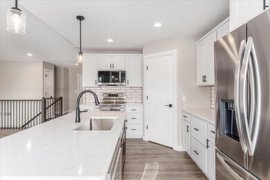 Plenty of cabinet space and a nice sized pantry!
