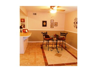 Dining area ceramic tile floors, walls freshly pai