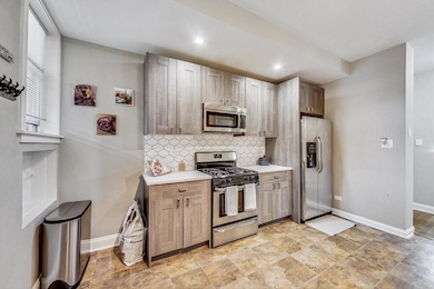 Huge space with quartz counterops and stainless ap