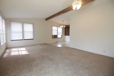 Living room view to dining area
