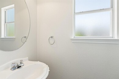 Bathroom with a healthy amount of sunlight and a 