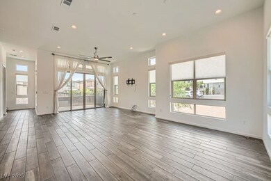 Unfurnished living room with recessed lighting, da