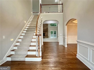Foyer with Refinished Hardwood Floors