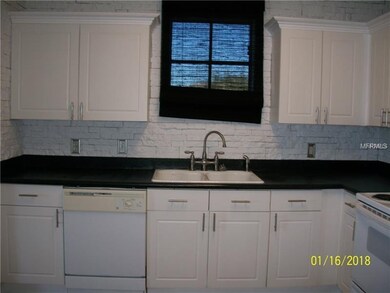 9401 Crescent Loop Cir unit 206, Tampa, FL 33619 - photo 3