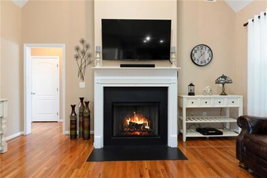 Living area featuring a fireplace with flush heart