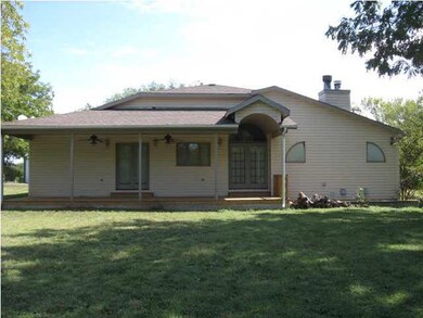 Large family room leads out to the beautiful cover