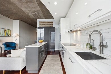 Kitchen featuring modern cabinets, wood finished 