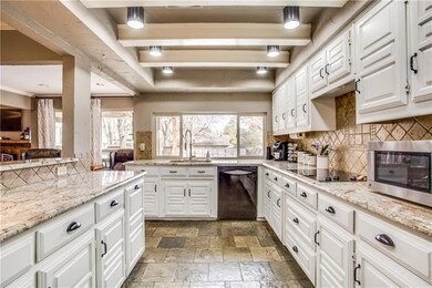 GRANITE COUNTERTOPS~WINDOW OVER SINK OVERLOOKING S