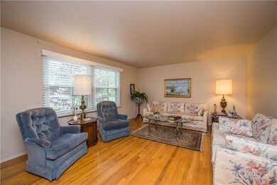 The living room measures a generous 18x13 and has 