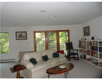 Living Room. The dining room is to...