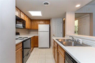 Galley kitchen, all appliances stay microwave and 