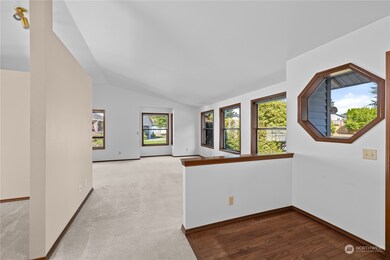 Entryway with hardwood floors.