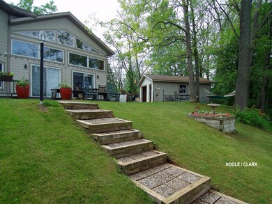 487 W 15 Mile Rd, Bitely, MI 49309 - photo 2