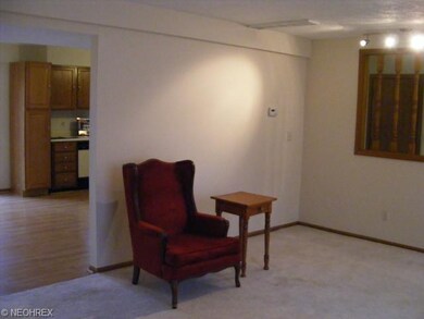 Just sit down and relax in this Living Room has en