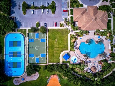 Arial footage of the club house, pool Tennis Court