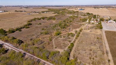 Aerial overview of property's location with rural landscape