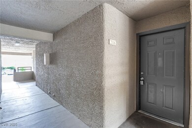 View of exterior entry with stucco siding