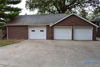 HUGE 4-car garage w/ openers.