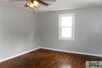 Warm, welcoming hardwood floors throughout.