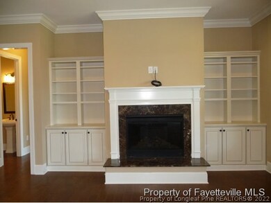 Fireplace w/ built​​‌​​​​‌​​‌‌​​​‌​​‌‌​‌‌​​​‌‌‌​​​​‌​​​​​‌ ins